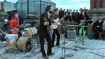 Ringo Starr, Paul McCartney, John Lennon, and George Harrison in THE BEATLES: GET BACK. Photo courtesy of Apple Corps Ltd. 